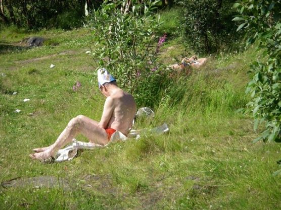 Trash is everywhere, even on people's heads.